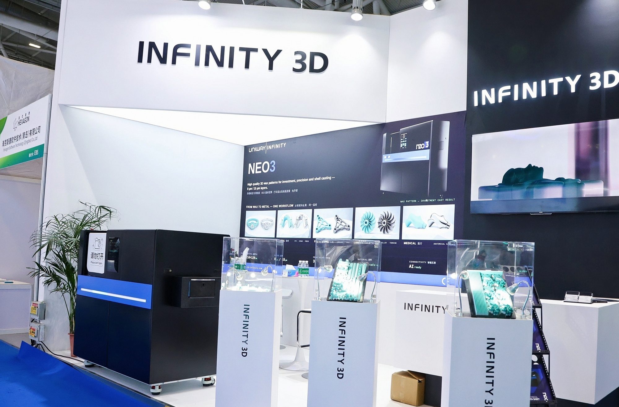 The Infinity 3D stand at Formnext Asia Shenzhen, showing the NEO3 wax printer and printed casting patterns